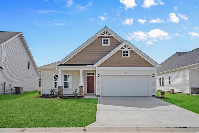 craftsman-style home with central AC, a garage, driveway, and a front yard