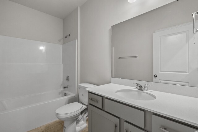 full bath with toilet, tile patterned floors, bathing tub / shower combination, and vanity
