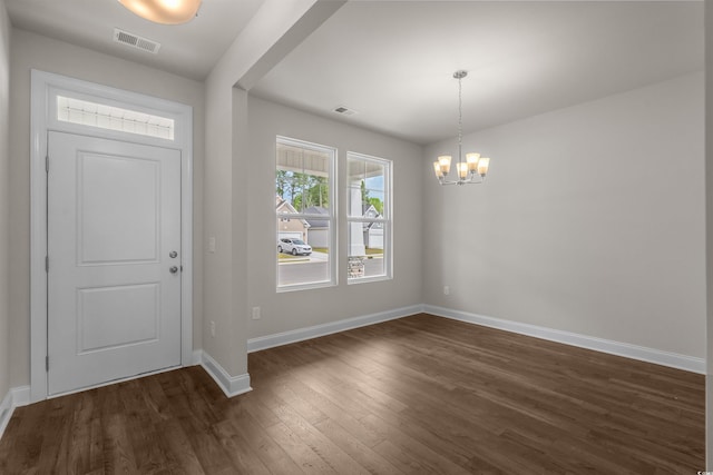1212 NW Calabash Station Blvd, Calabash, NC 28467 - foyer with baseboards, visible vents, an inviting chandelier, and dark wood-style flooring