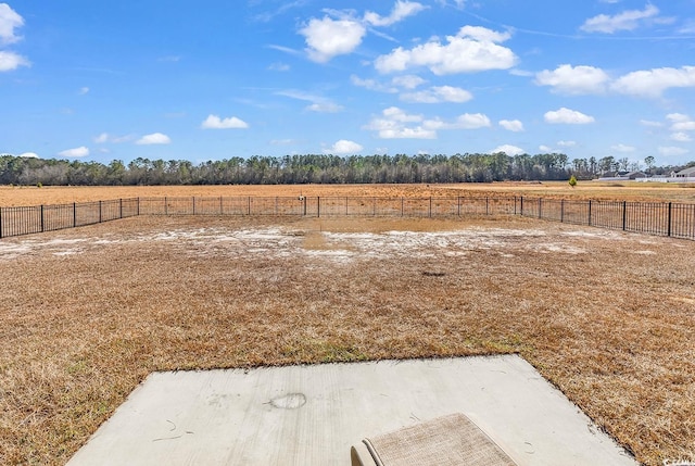 view of yard with a rural view