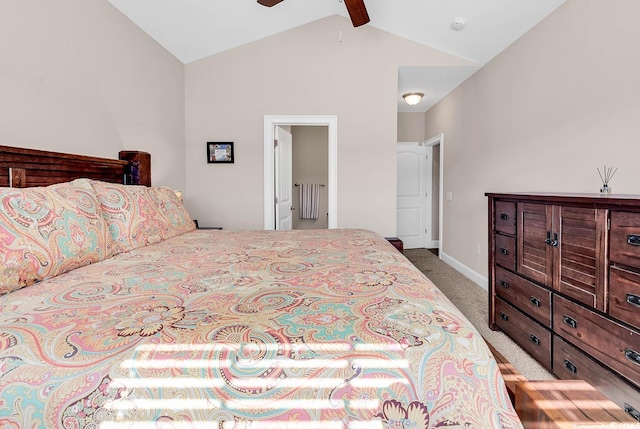 bedroom featuring ceiling fan, light colored carpet, and lofted ceiling