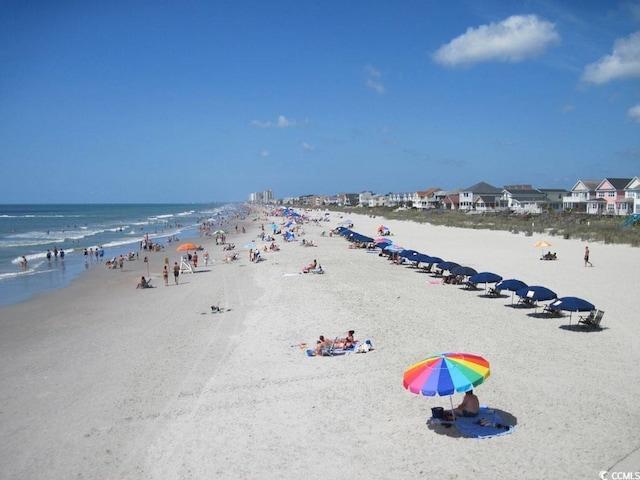 property view of water with a beach view