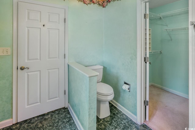 bathroom featuring toilet