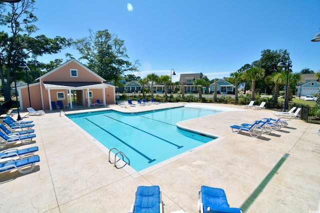 view of pool featuring a patio area