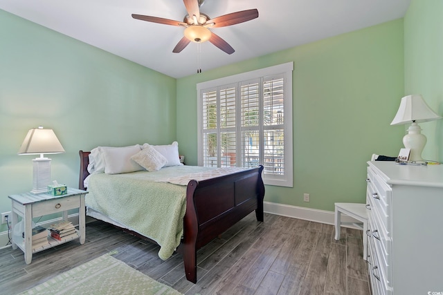 bedroom featuring wood-type flooring and ceiling fan