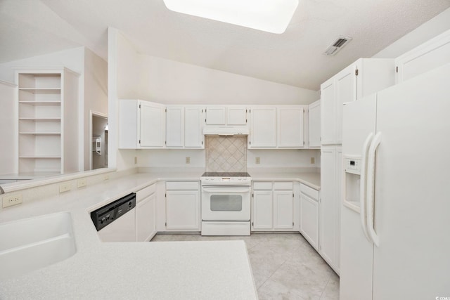 kitchen featuring vaulted ceiling, tasteful backsplash, sink, white cabinets, and white appliances