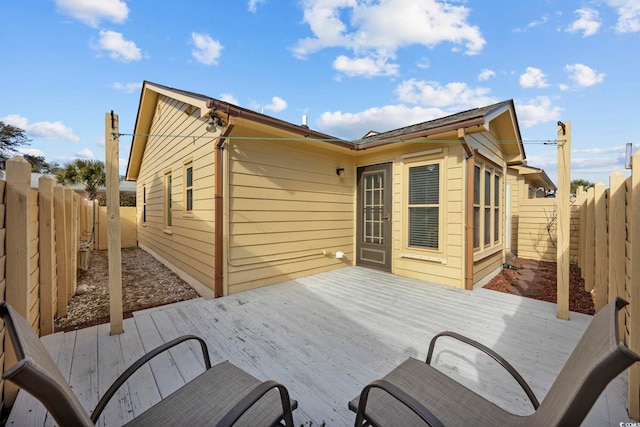 exterior space featuring a wooden deck