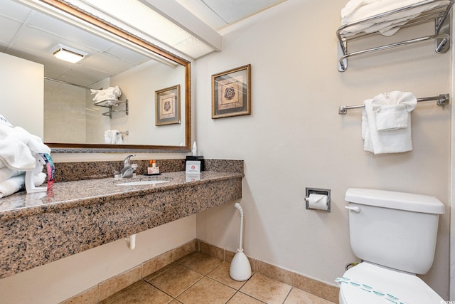 1105 S Ocean Blvd Unit 252, Myrtle Beach, SC 29577 - bathroom featuring a sink, tile patterned floors, toilet, and baseboards