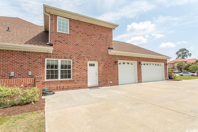 exterior space with a garage