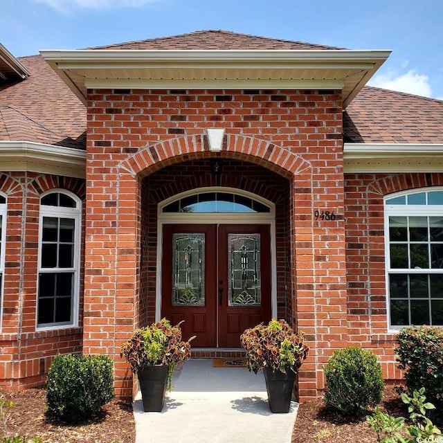 doorway to property featuring french doors