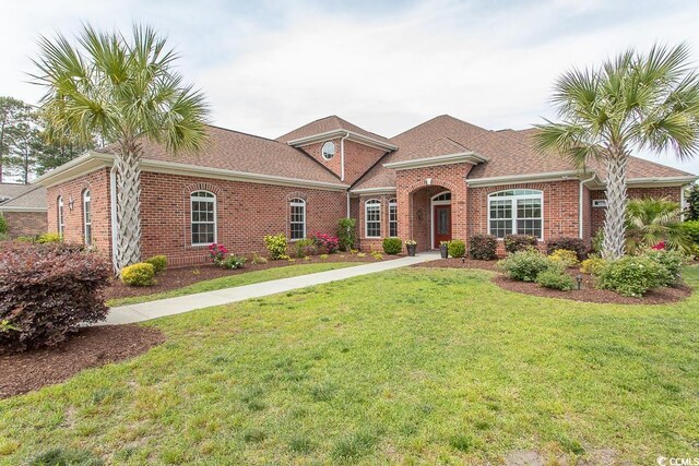 view of front of home with a front lawn