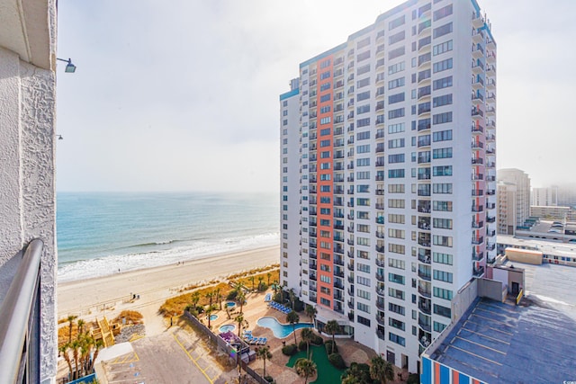 property view of water featuring a beach view