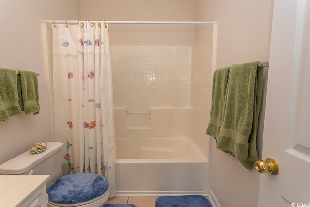 full bathroom featuring shower / bath combo, vanity, tile patterned floors, and toilet