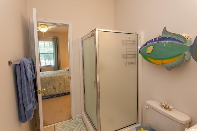 bathroom with toilet and walk in shower