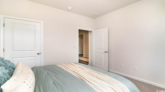 bedroom featuring carpet