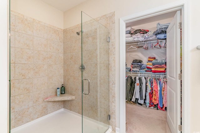 bathroom featuring an enclosed shower