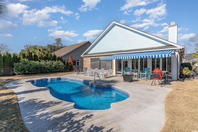 view of swimming pool featuring a patio