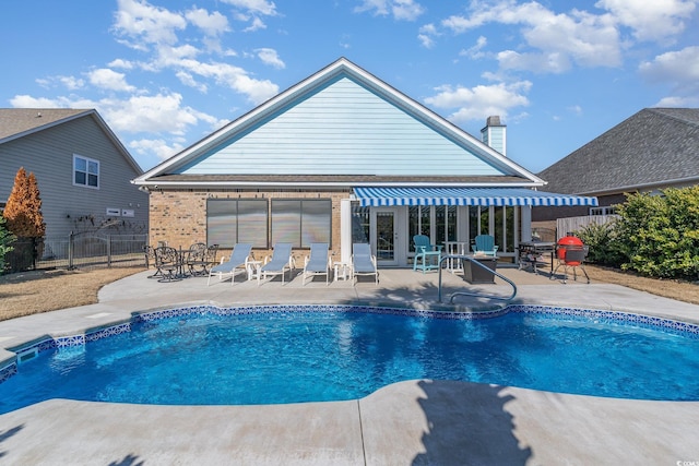 view of pool featuring a patio area