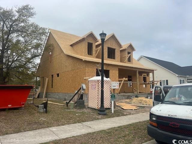 1004 James Island Ave, North Myrtle Beach, SC 29582 - view of front facade with a porch