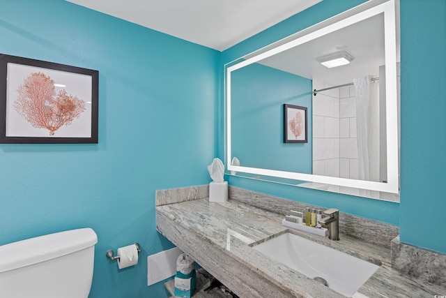 7200 N Ocean Blvd Unit 138, Myrtle Beach, SC 29572 - bathroom with toilet, vanity, and curtained shower