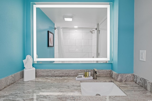 7200 N Ocean Blvd Unit 138, Myrtle Beach, SC 29572 - bathroom with vanity and tiled shower