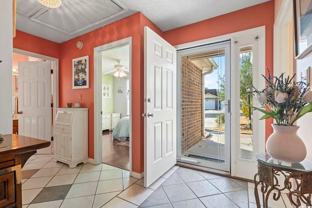 461 Spauldingwood Rd, Little River, SC 29566 - foyer entrance with light tile patterned floors, baseboards, and a ceiling fan