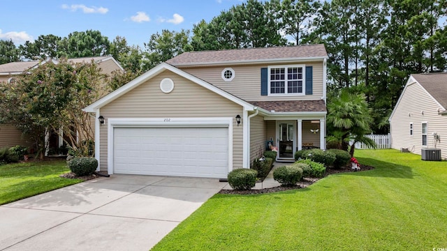 front of property with cooling unit, a garage, a front lawn, and a porch