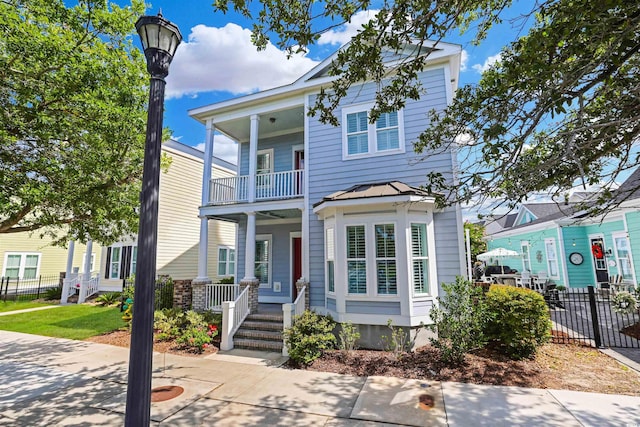 822 Farrow Pkwy, Myrtle Beach, SC 29577 - view of property featuring a porch, a balcony, a standing seam roof, and a metal roof