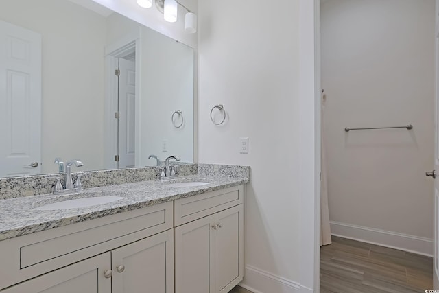 822 Farrow Pkwy, Myrtle Beach, SC 29577 - bathroom featuring double vanity and wood finished floors