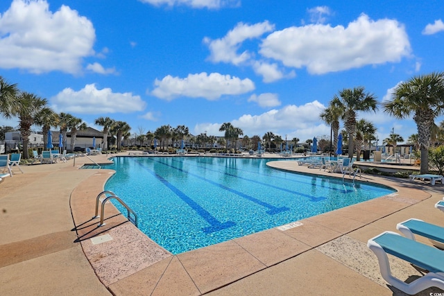 community pool with a patio