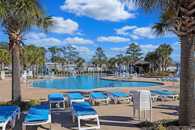 community pool featuring a patio area