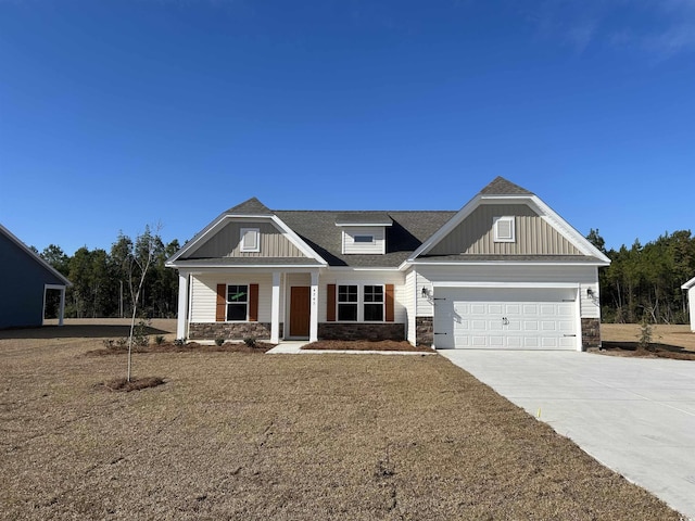 craftsman inspired home featuring board and batten siding, stone siding, a shingled roof, and concrete driveway