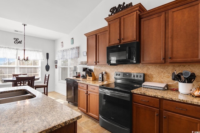 kitchen featuring stainless steel range with electric cooktop, tasteful backsplash, decorative light fixtures, vaulted ceiling, and a notable chandelier