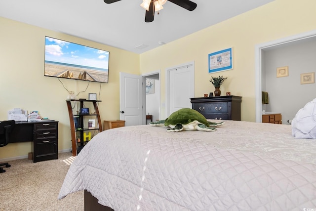 bedroom with ceiling fan and carpet