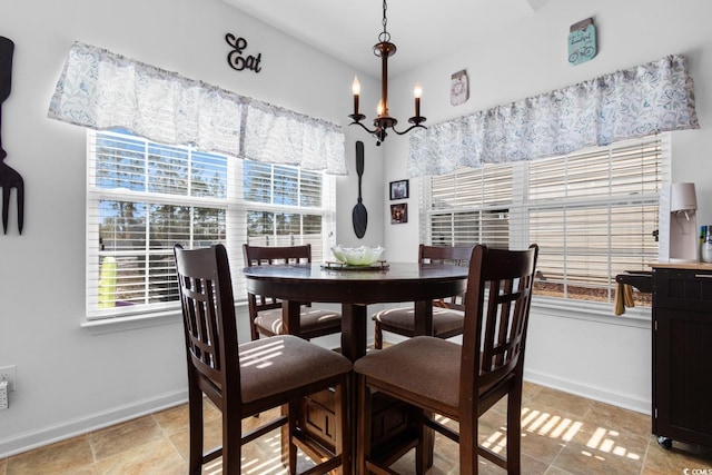 dining area with a chandelier