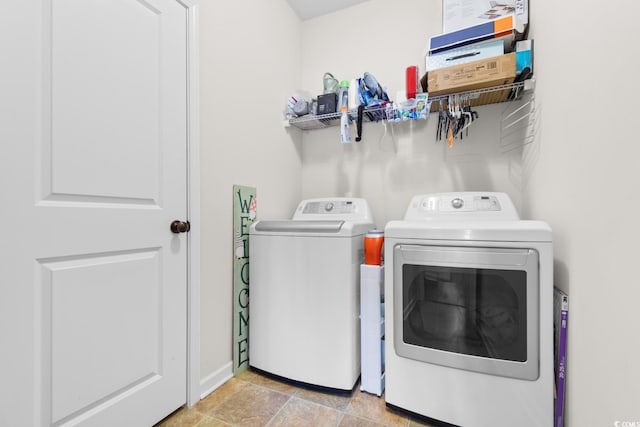 washroom featuring separate washer and dryer