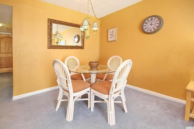 9550 Shore Dr Unit 1721, Myrtle Beach, SC 29572 - carpeted dining room with a textured ceiling, lofted ceiling, and baseboards