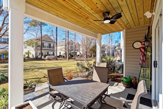 view of patio featuring ceiling fan