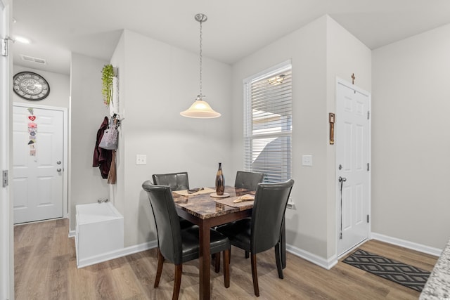 dining room featuring hardwood / wood-style floors