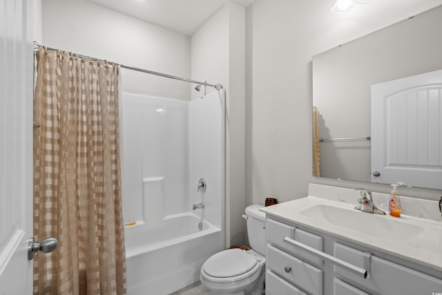 full bathroom featuring shower / bathtub combination with curtain, vanity, and toilet