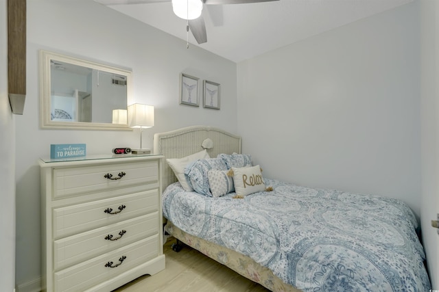 bedroom featuring ceiling fan and light wood-type flooring