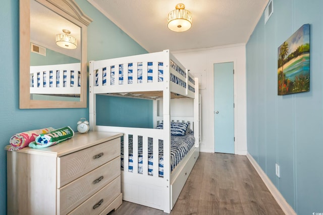 bedroom featuring hardwood / wood-style floors