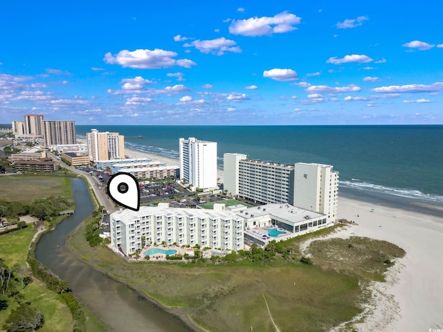 drone / aerial view with a view of the beach and a water view