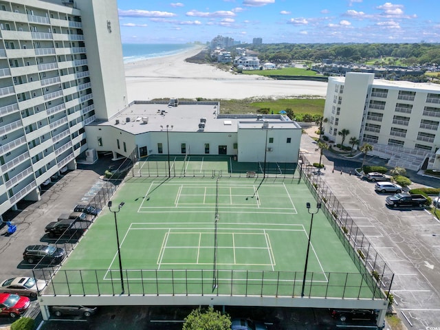 bird's eye view with a view of the beach and a water view