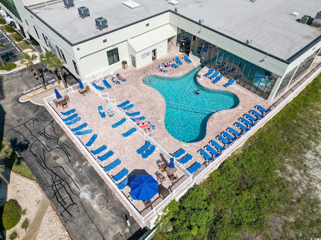 view of swimming pool with a patio