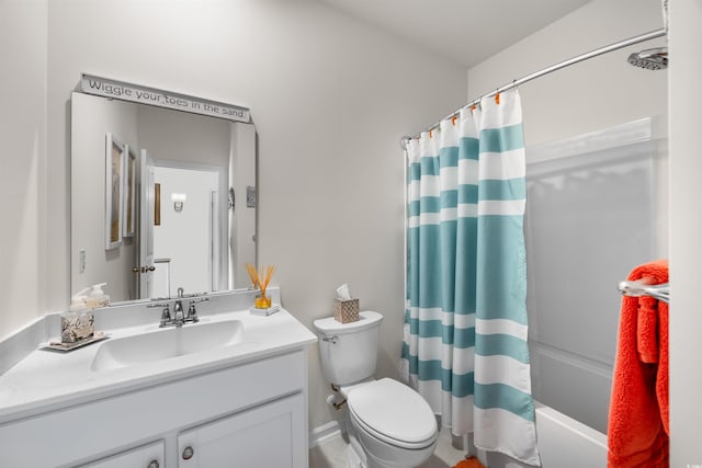 full bath with vanity, toilet, and shower / bath combo with shower curtain