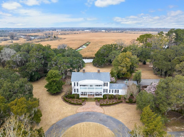 birds eye view of property featuring a rural view