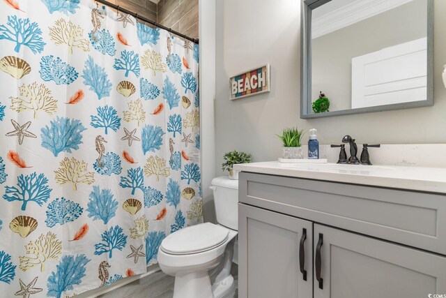 mudroom with hardwood / wood-style flooring and ornamental molding