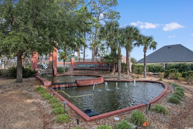 view of property's community with a water view