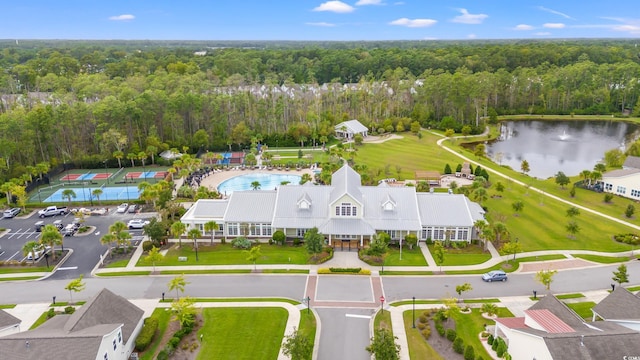 birds eye view of property featuring a water view